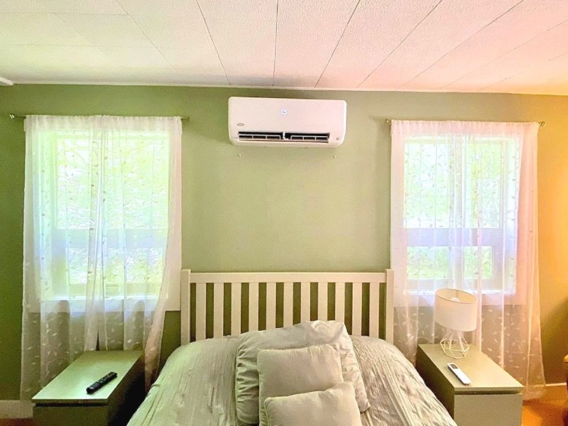 Ductless mini-split system installed in a bedroom by WNC Climate Control in Weaverville, NC