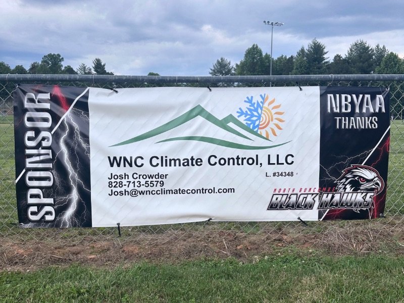 WNC Climate Control sponsor banner for the North Buncombe Black Hawks youth athletics