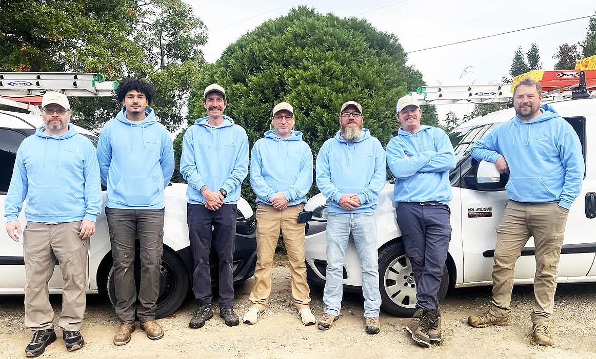 The WNC Climate Control team in front of their service vans in Weaverville, NC
